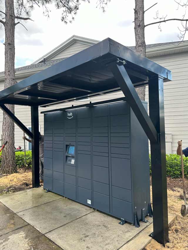 Freestanding aluminum structure for protecting mailbox station.