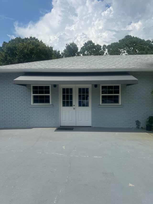 Another custom awning entrance way by Greenwood Awnings & Metal Works.