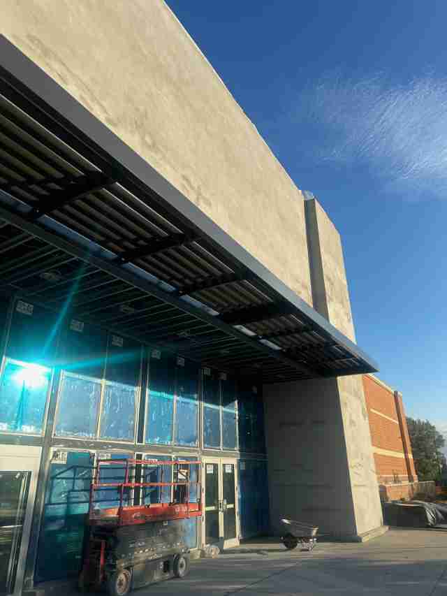 Modern and stylish metal awnings accent this commercial storefront.